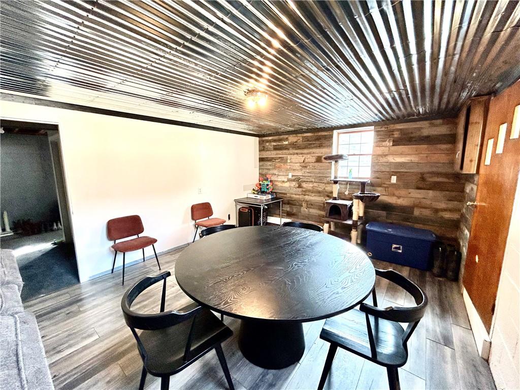502 Ferguson Road Dunbar, PA 15431 - Photo 13 of 32 a view of a dining room with furniture and wooden floor