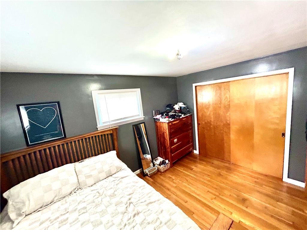502 Ferguson Road Dunbar, PA 15431 - Photo 25 of 32 a bed sitting in a bedroom next to a window