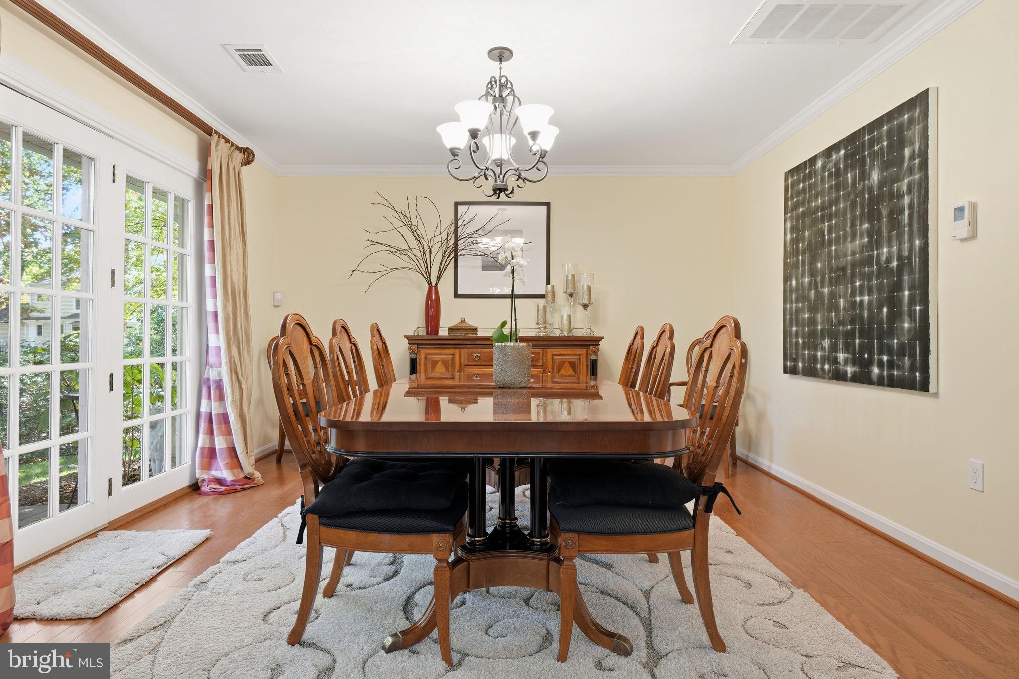 1507 Laurel Hill Road Vienna, VA 22182 - Photo 12 of 60 Separate dining room with french doors to yard