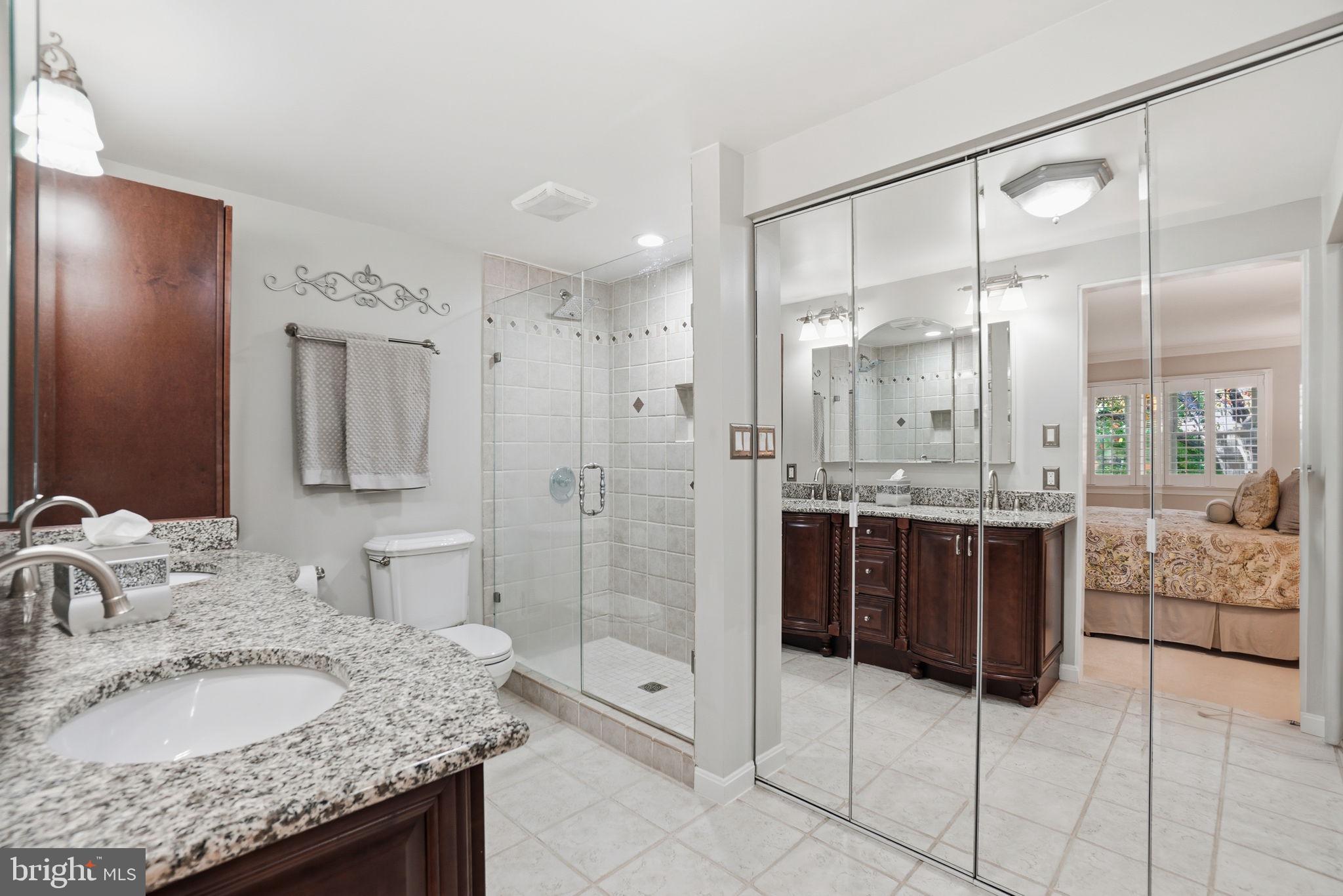 1507 Laurel Hill Road Vienna, VA 22182 - Photo 23 of 60 Spa like primary bath w/mirrored closets!