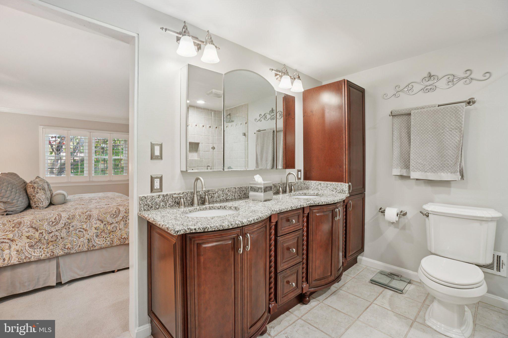 1507 Laurel Hill Road Vienna, VA 22182 - Photo 24 of 60 Renovated bath with handsome dual vanities