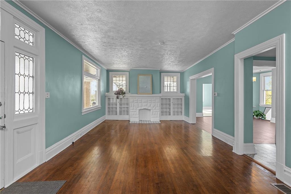 2 Marshall Road Pittsburgh, PA 15214 - Photo 12 of 46 wooden floor in an empty room with windows and wooden floor