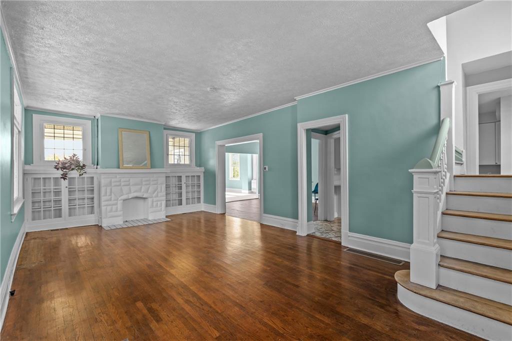 2 Marshall Road Pittsburgh, PA 15214 - Photo 13 of 46 a view of an empty room with wooden floor and a living room