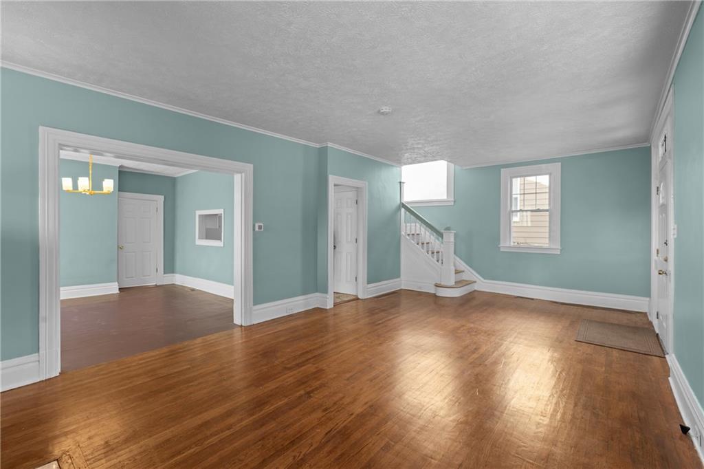 2 Marshall Road Pittsburgh, PA 15214 - Photo 14 of 46 a view of empty room with wooden floor and fan