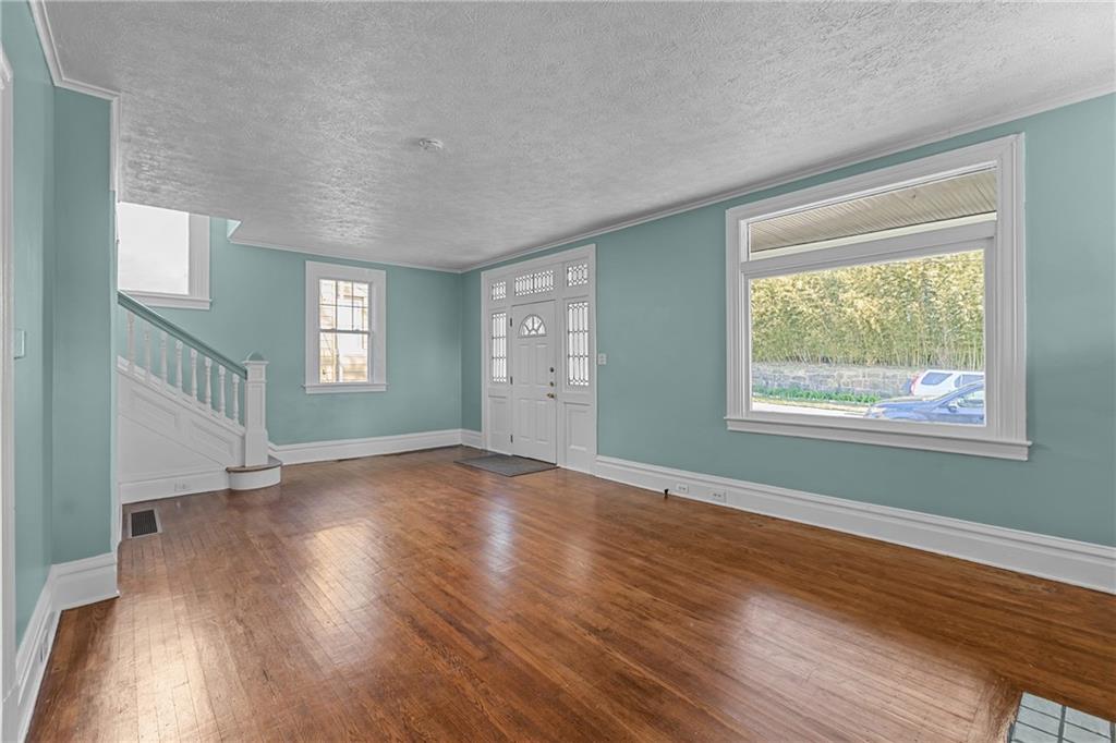 2 Marshall Road Pittsburgh, PA 15214 - Photo 15 of 46 a view of an empty room with wooden floor and a window