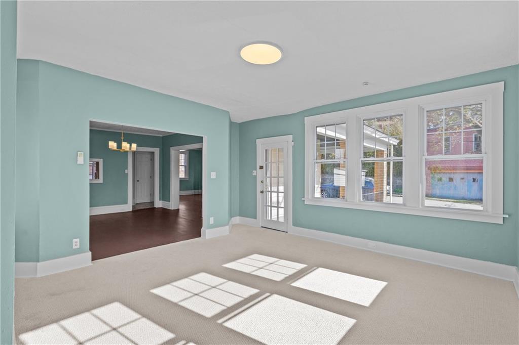 2 Marshall Road Pittsburgh, PA 15214 - Photo 22 of 46 a big room with windows and ceiling fan