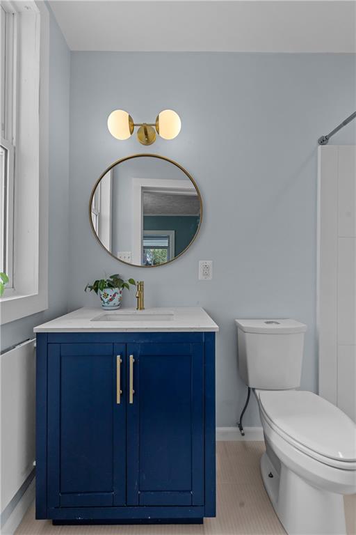 2 Marshall Road Pittsburgh, PA 15214 - Photo 24 of 46 a bathroom with a toilet a sink and mirror