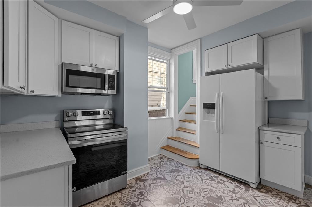 2 Marshall Road Pittsburgh, PA 15214 - Photo 27 of 46 a kitchen with a refrigerator stove and microwave
