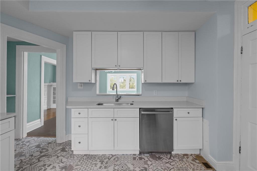 2 Marshall Road Pittsburgh, PA 15214 - Photo 29 of 46 a kitchen with white cabinets