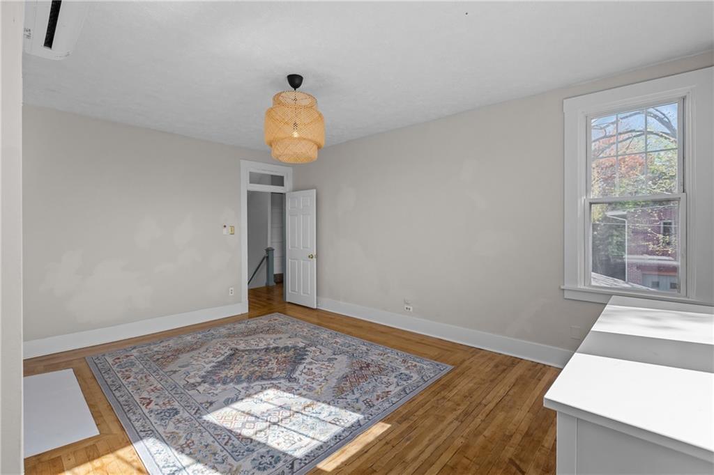 2 Marshall Road Pittsburgh, PA 15214 - Photo 32 of 46 a view of an empty room with wooden floor and a window