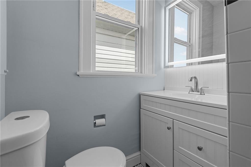 2 Marshall Road Pittsburgh, PA 15214 - Photo 39 of 46 a bathroom with a toilet sink and window