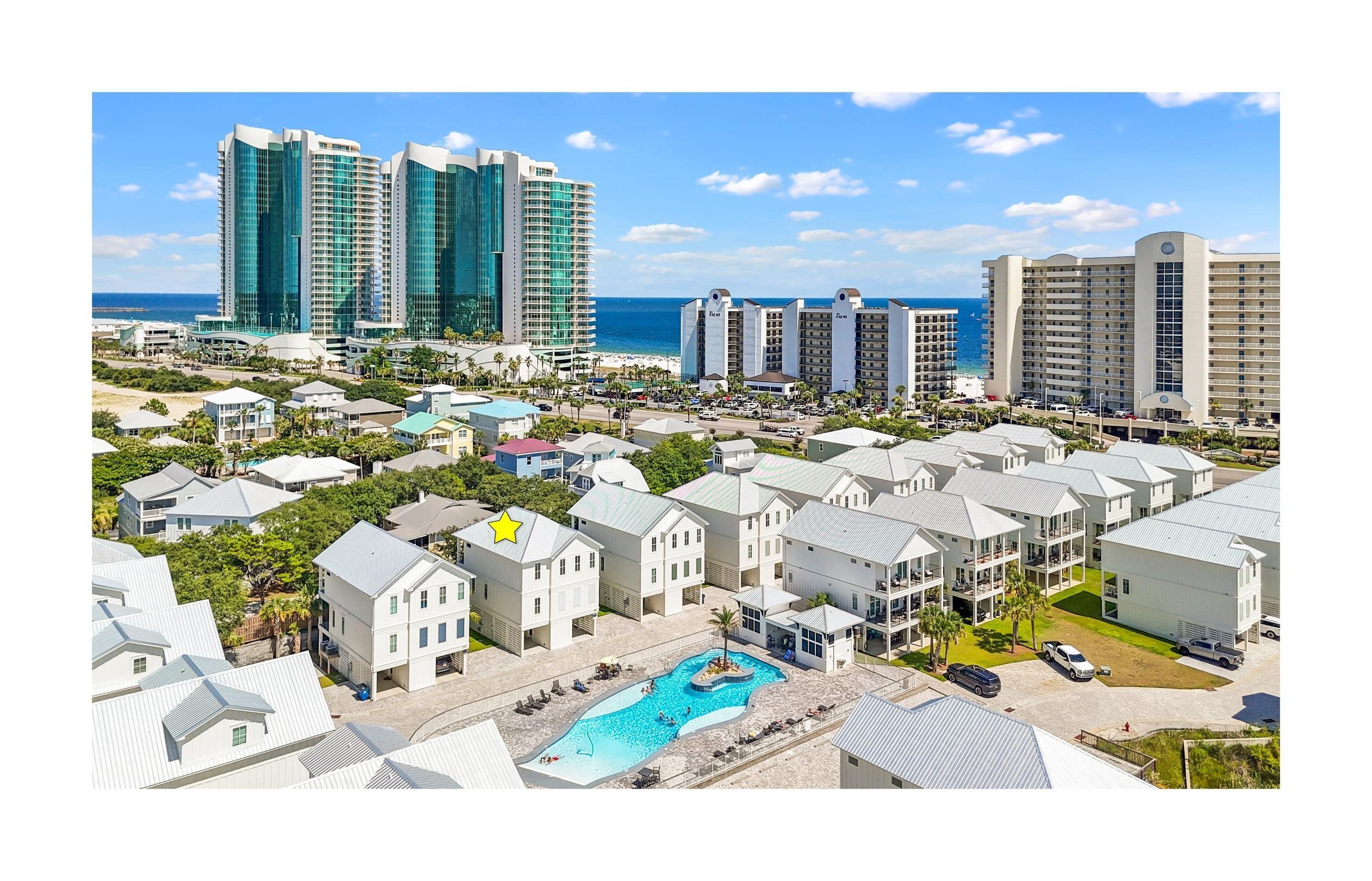 3188 Egret Run Orange Beach, AL 36561 - Photo 1 of 37 Aerial view of a large body of water and a pool