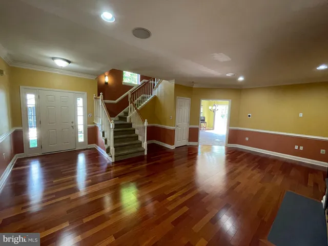 a view of kitchen with furniture and fireplace