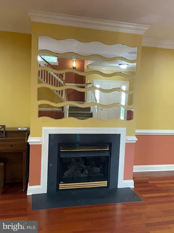 a view of balcony with wooden floor and fence
