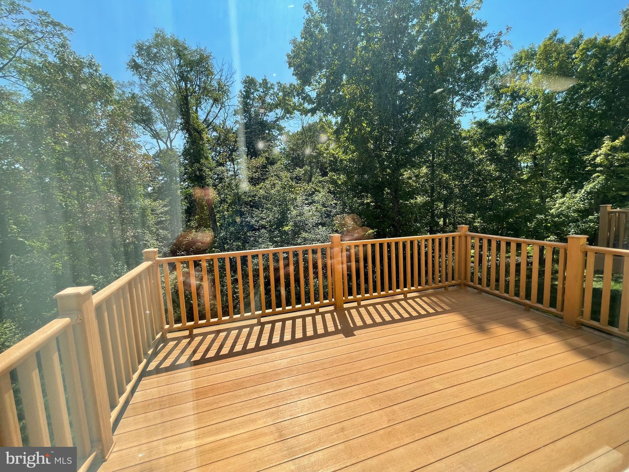 19 Arbor Circle Colmar, PA 18915 - Photo 26 of 60 a balcony with wooden floor and trees