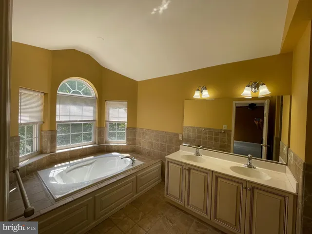 a bathroom with a sink and toilet