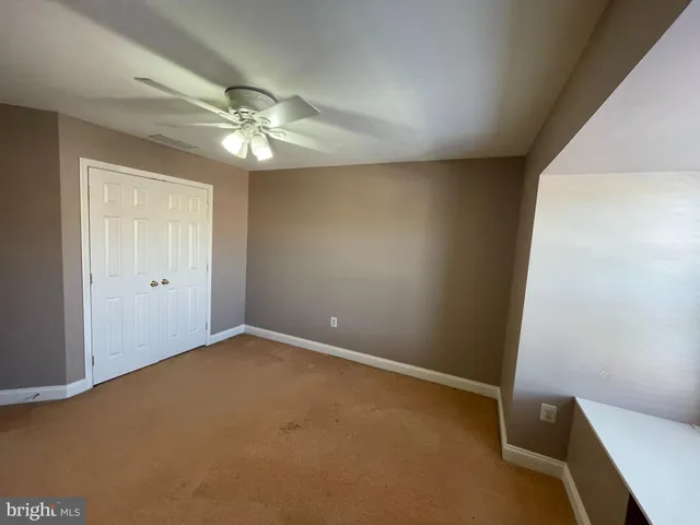a view of a livingroom with a staircase