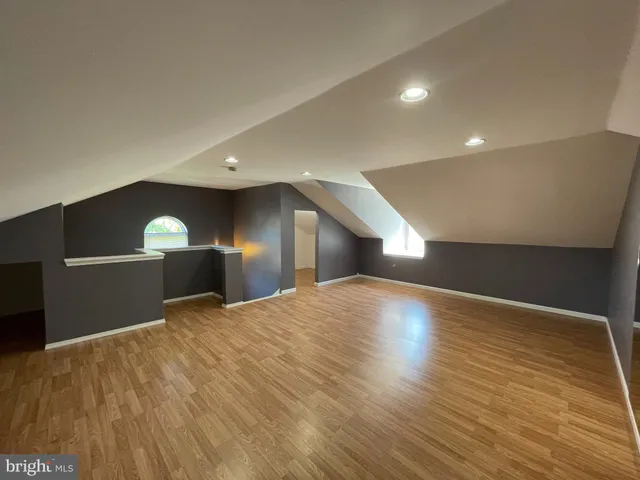 a view of a hallway with workspace