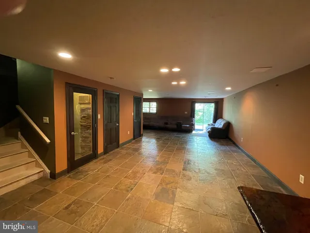 wooden floor and windows in an empty room