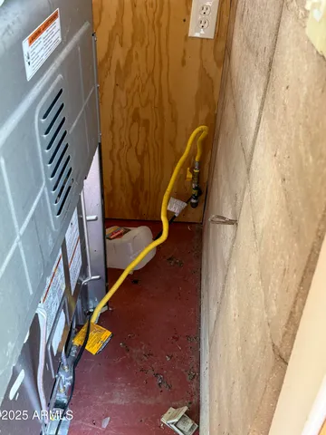 a livingroom with furniture and a window