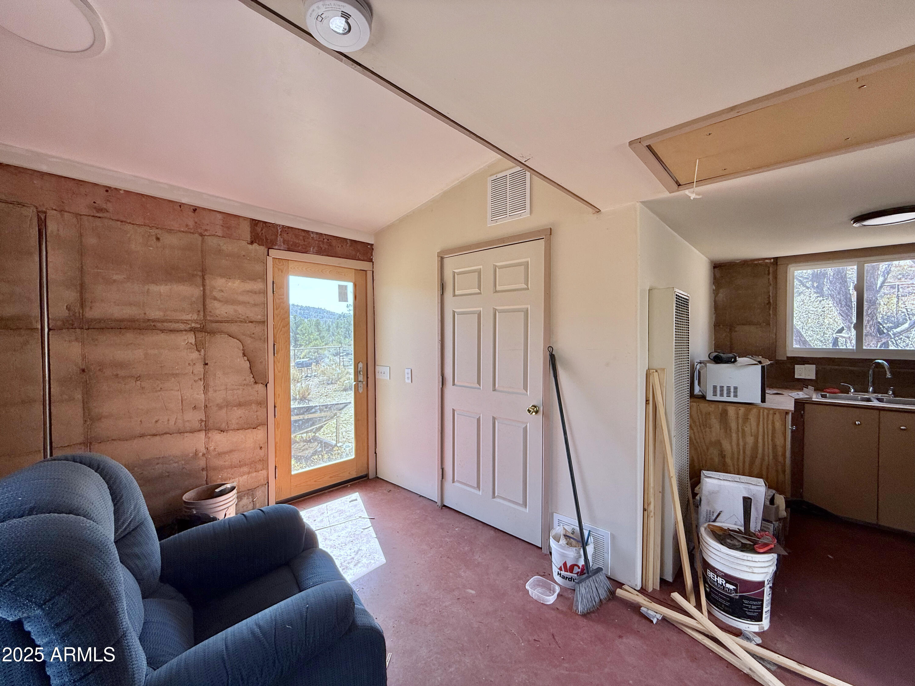 19250 Model Creek Road, Unit 4 Kirkland, AZ 86332 - Photo 19 of 57 a livingroom with furniture and a window