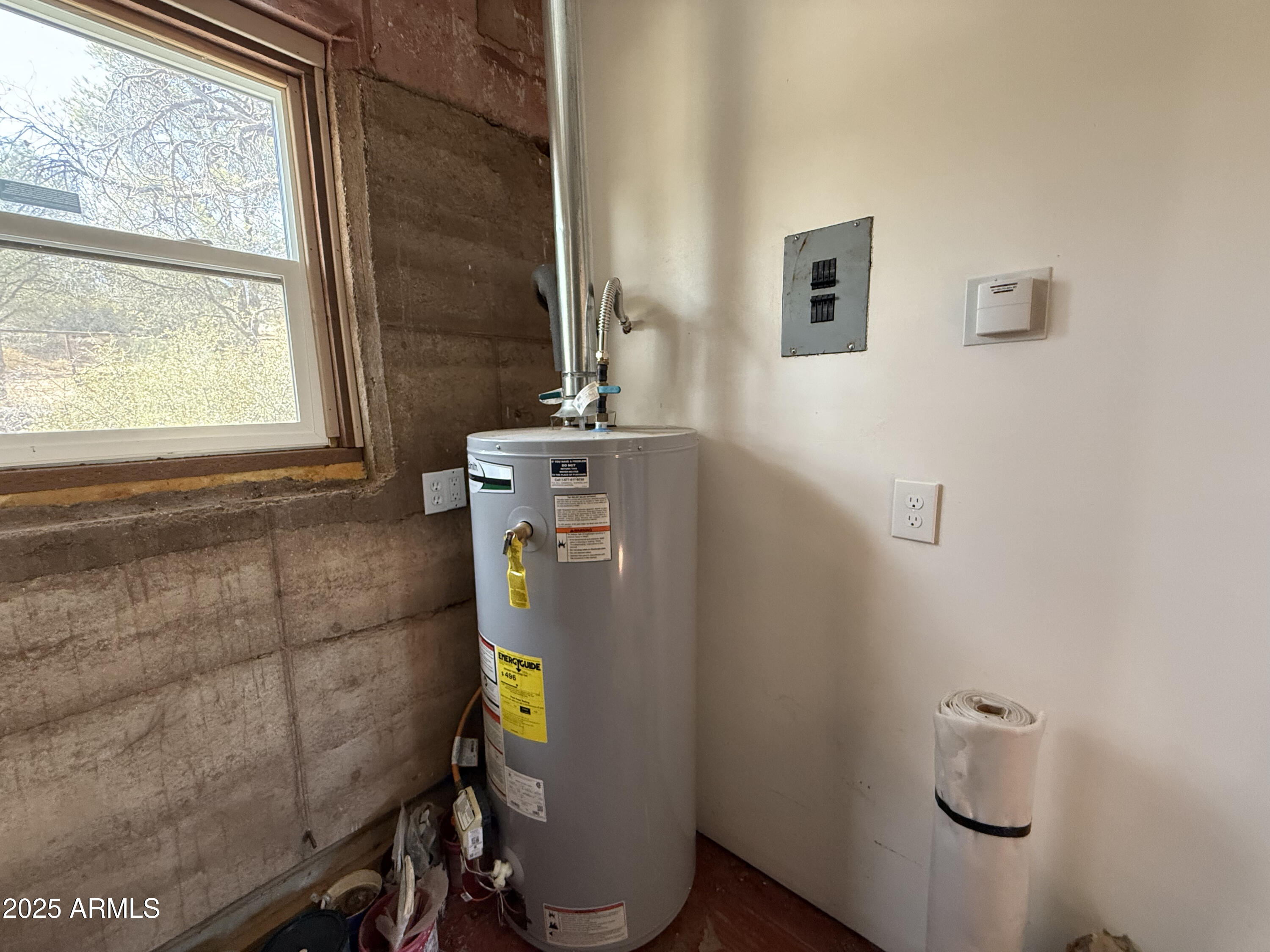 19250 Model Creek Road, Unit 4 Kirkland, AZ 86332 - Photo 31 of 57 a room with storage and utility