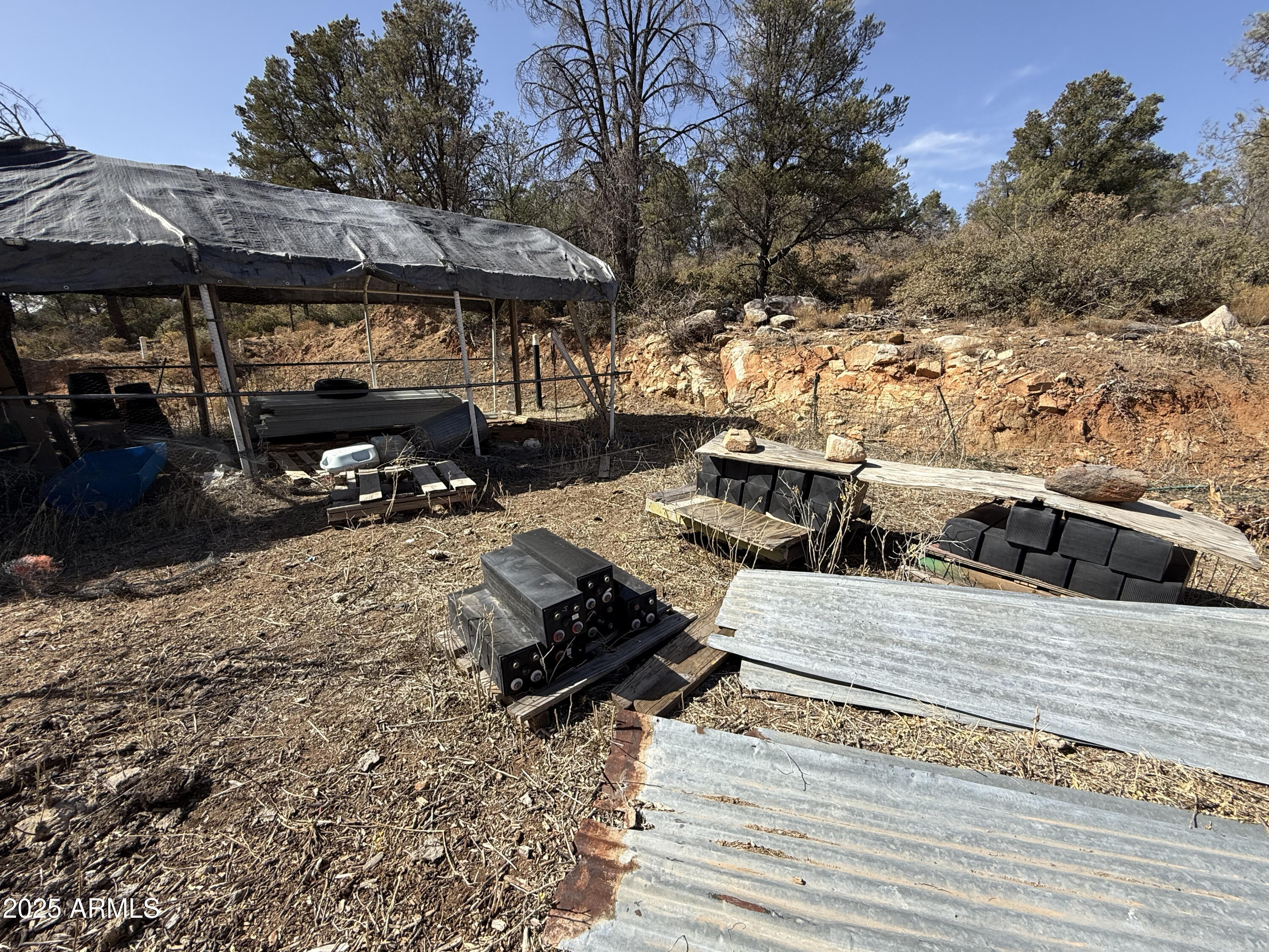 19250 Model Creek Road, Unit 4 Kirkland, AZ 86332 - Photo 35 of 57 a view of a car parked on the side of the road