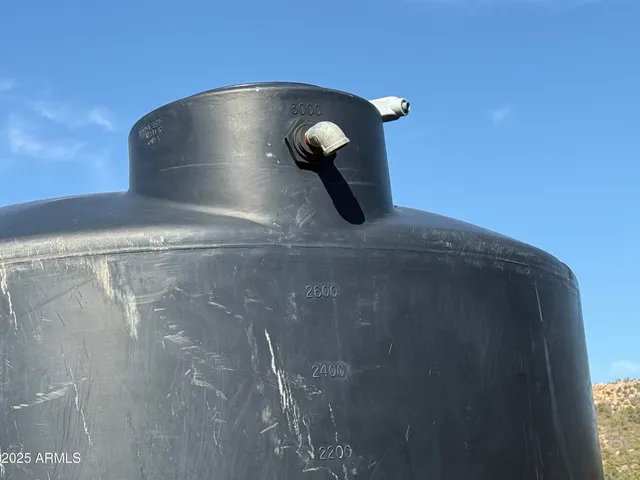a view of a town with mountains in the background