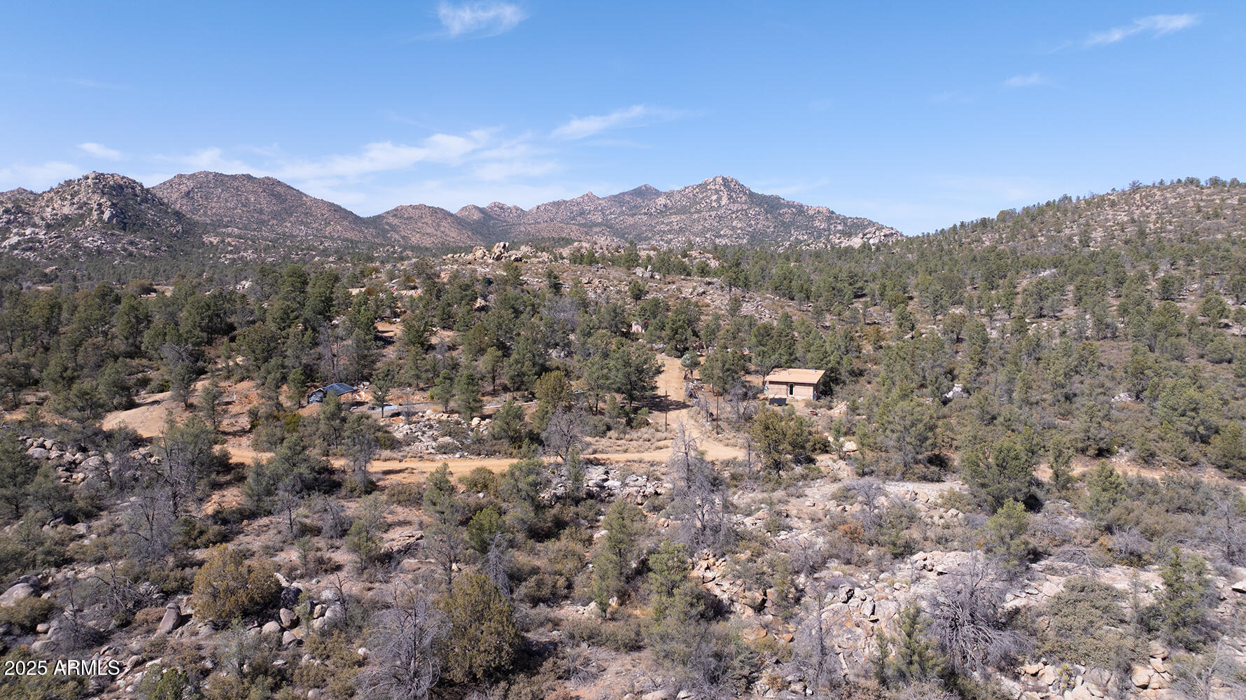 19250 Model Creek Road, Unit 4 Kirkland, AZ 86332 - Photo 54 of 57 a view of a large tree in a field
