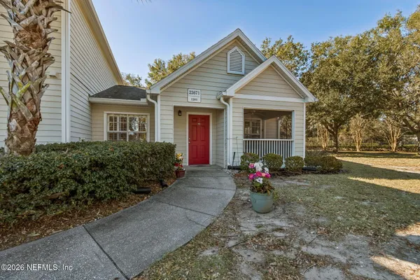 front view of a house with a yard
