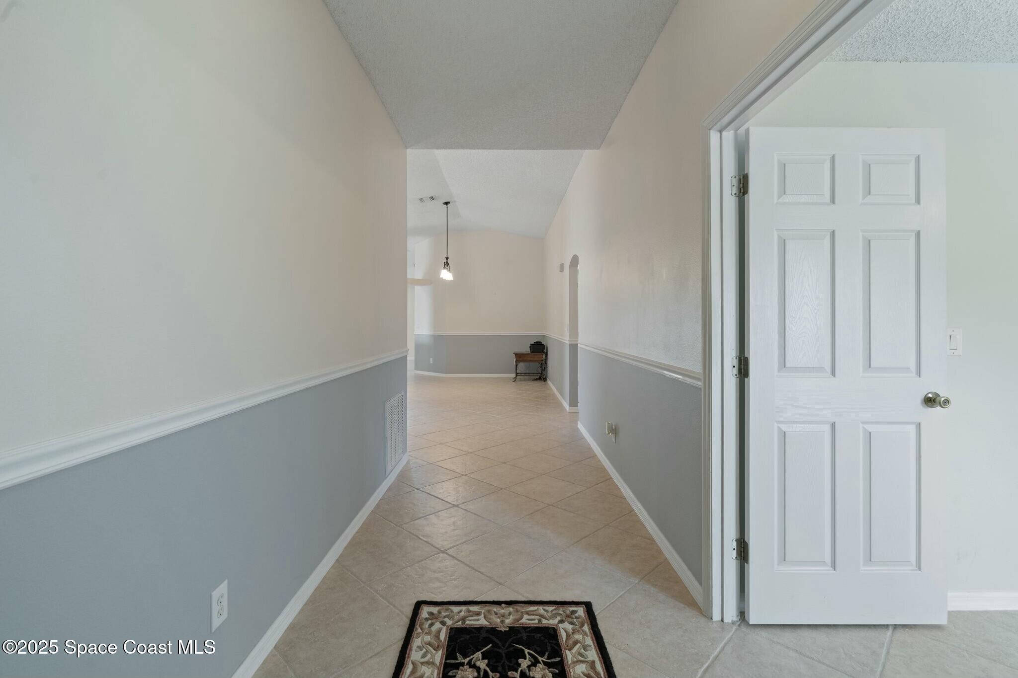 2405 Bayhill Drive Melbourne, FL 32940 - Photo 18 of 36 a view of a hallway