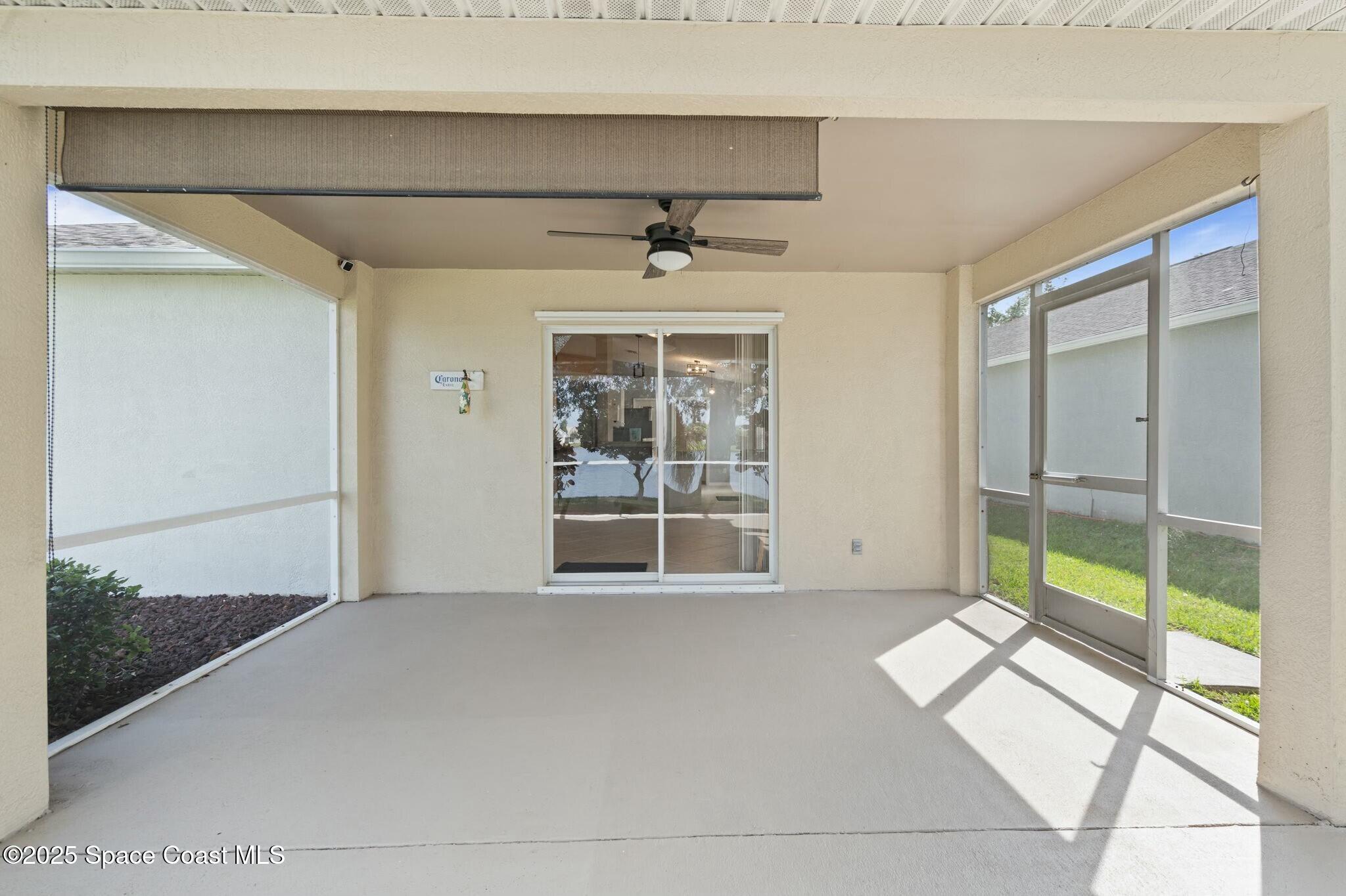 2405 Bayhill Drive Melbourne, FL 32940 - Photo 27 of 36 a view of an empty room with a window