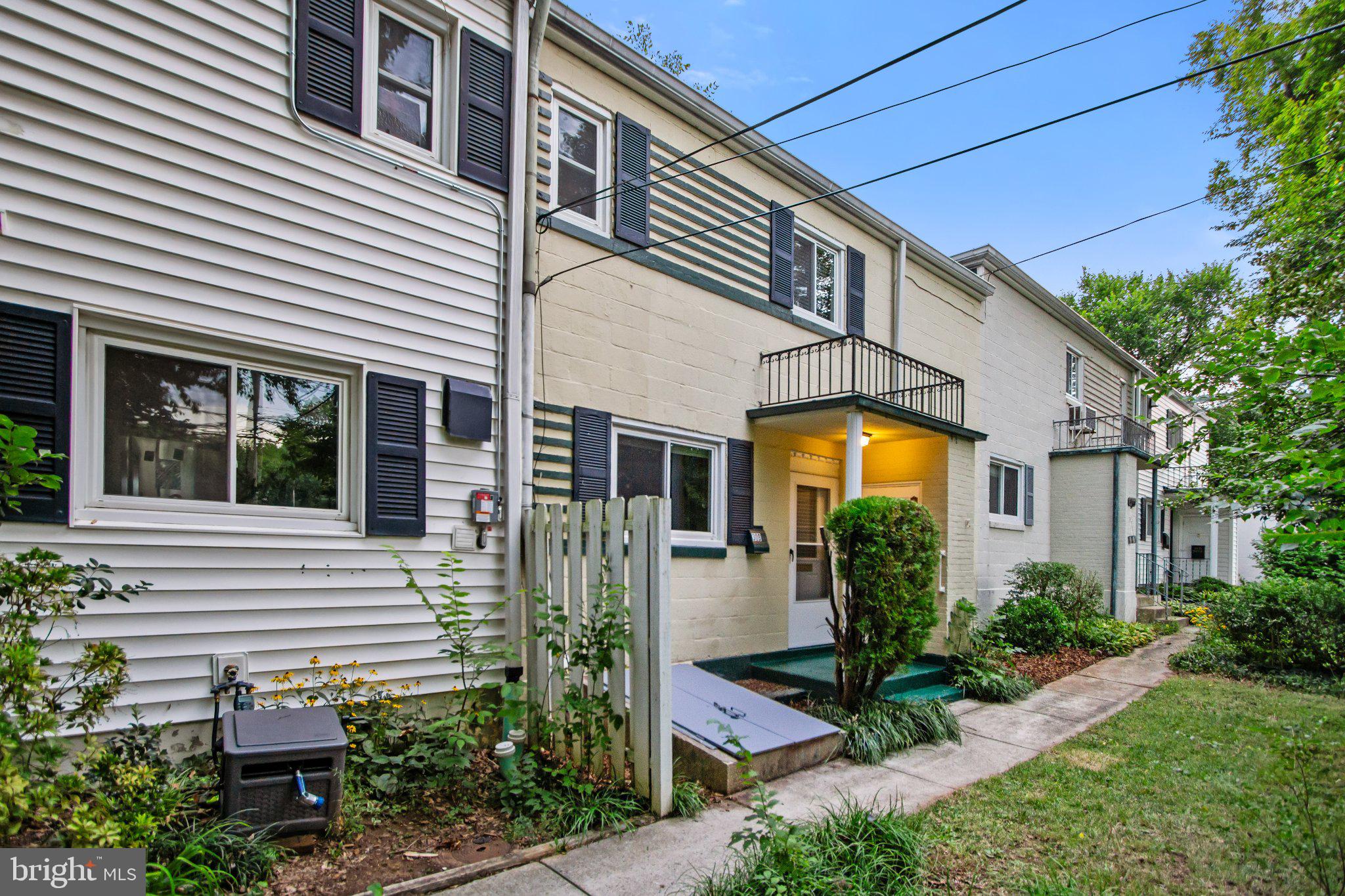 30 Ridge Road, Unit B Greenbelt, MD 20770 - Photo 2 of 30 Charming duplex with lush greenery.