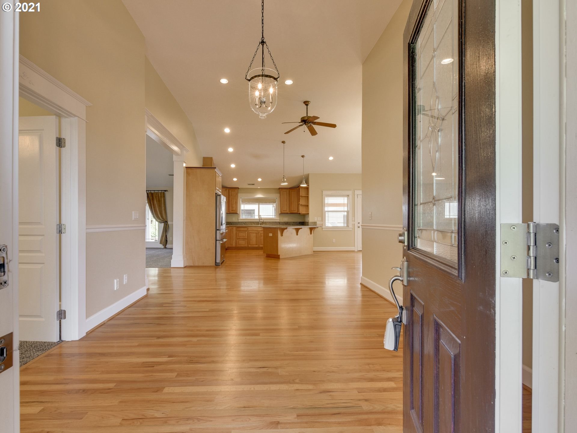 5171 South Elliott Prairie Road Woodburn, OR 97071 - Photo 3 of 32 a view of a kitchen and an empty room