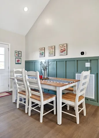 a view of a dining room with furniture
