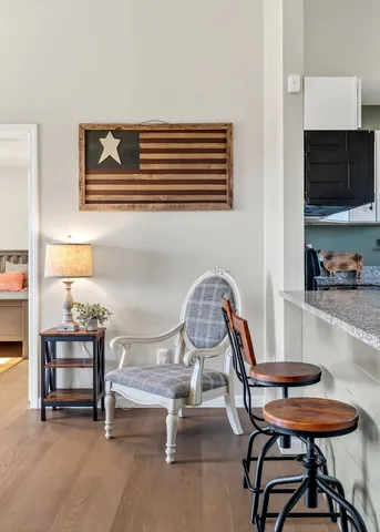 a workspace with furniture and a flat screen tv