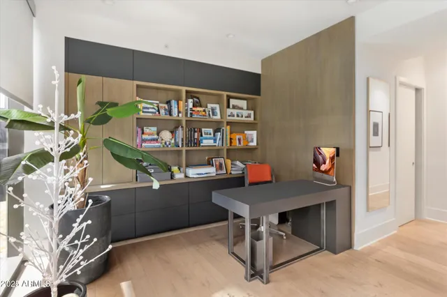 a view of a workspace with furniture