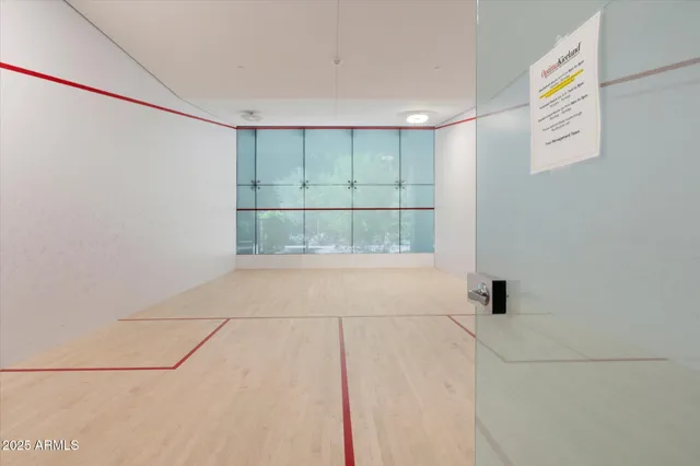 a view of a hallway with seating area