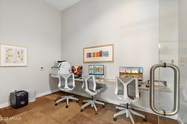 a living room with furniture a lamp and a chandelier