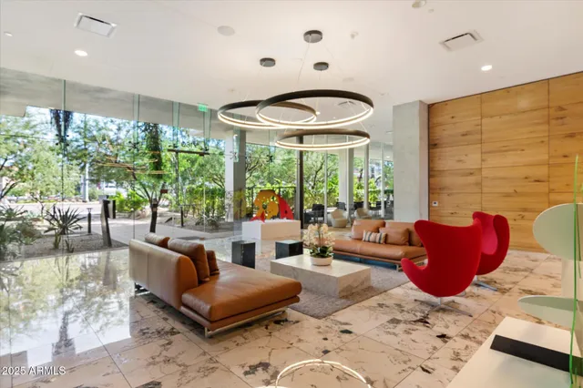 a large room with furniture and a large window