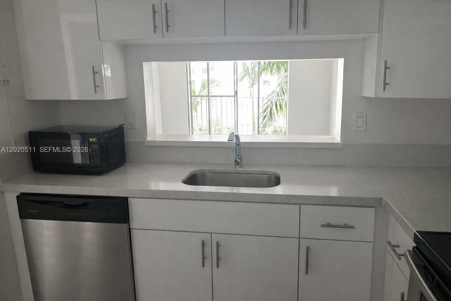 496 Northwest 165th Street, Unit D412 Miami, FL 33169 - Photo 15 of 34