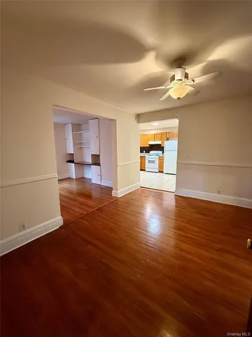 a view of a livingroom with wooden floor