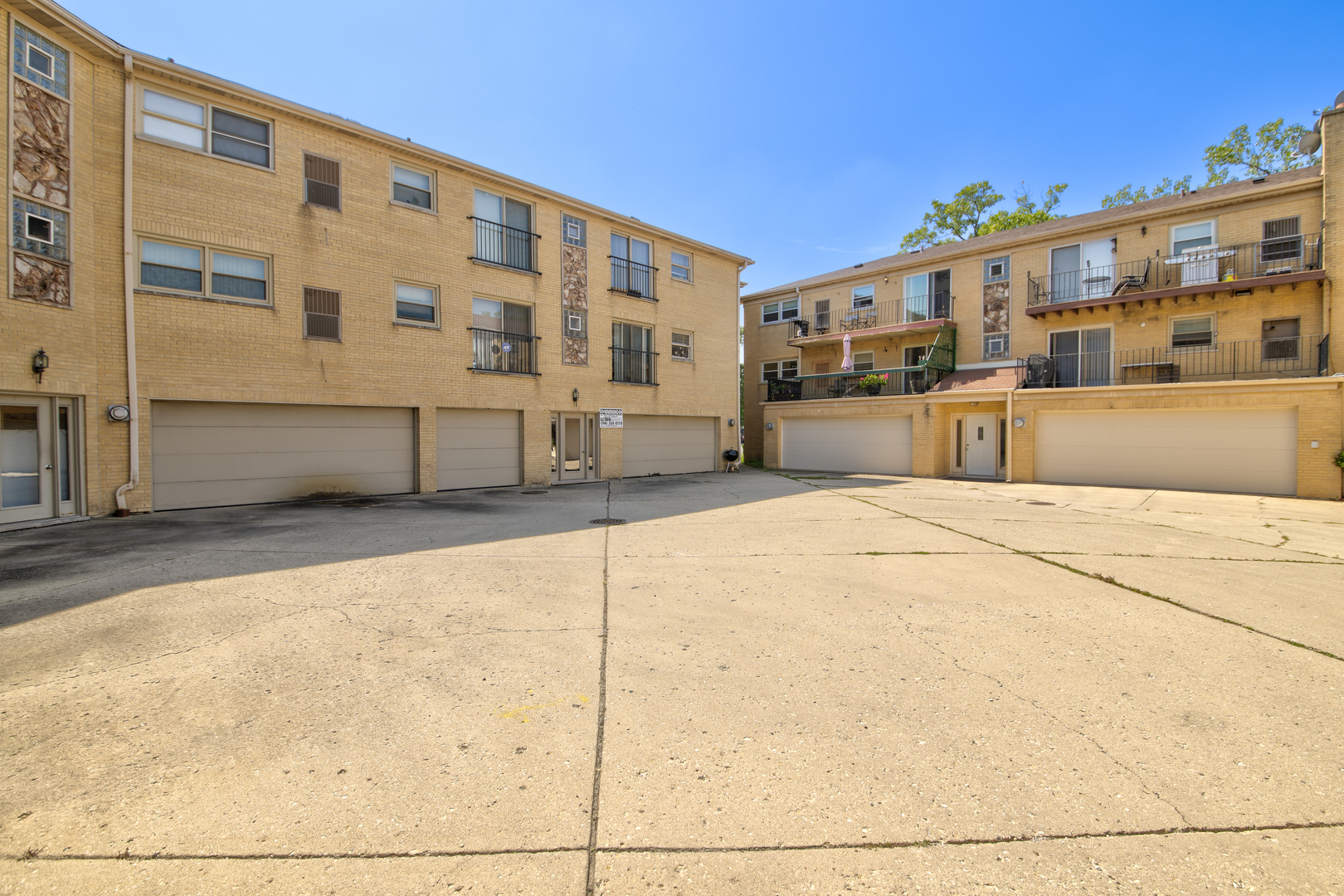 3207 North Pontiac Avenue, Unit 2S Chicago, IL 60634 - Photo 13 of 13 a view of building with large windows