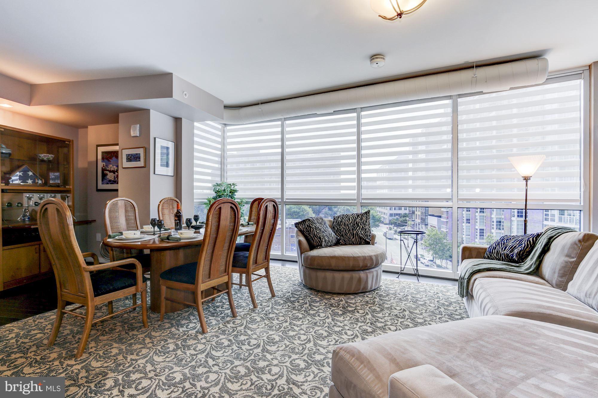 1025 First Street Southeast, Unit 613 Washington, DC 20003 - Photo 11 of 30 a living room with furniture and a large window