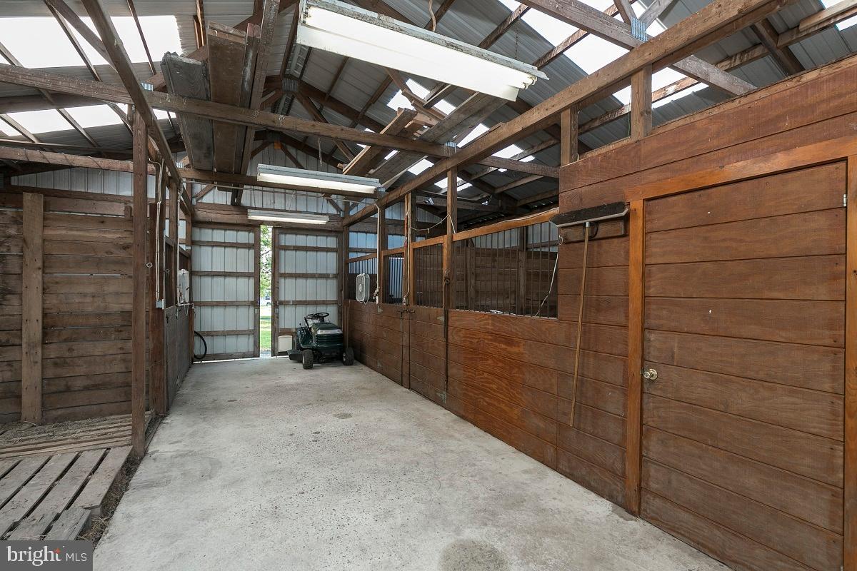 56 Little Road Perkiomenville, PA 18074 - Photo 46 of 59 interior barn, stalls, feed room and tack room