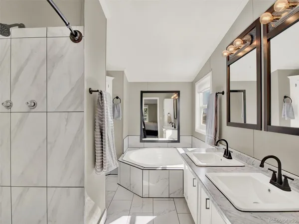 a bathroom with a sink and mirror
