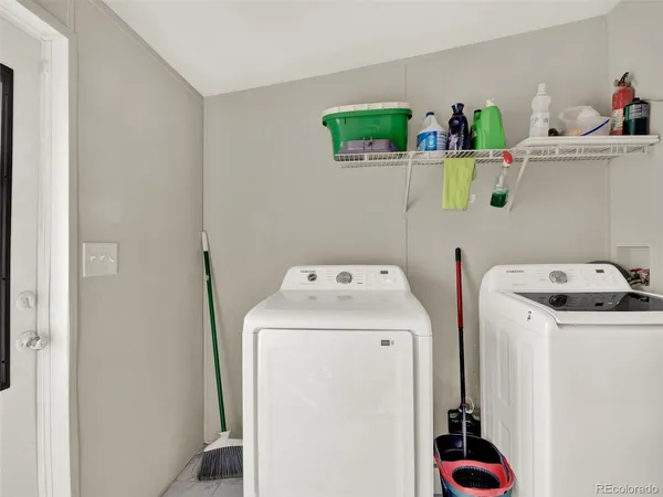 a utility room with dryer and washer