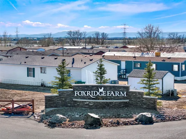 a view of a street with cars