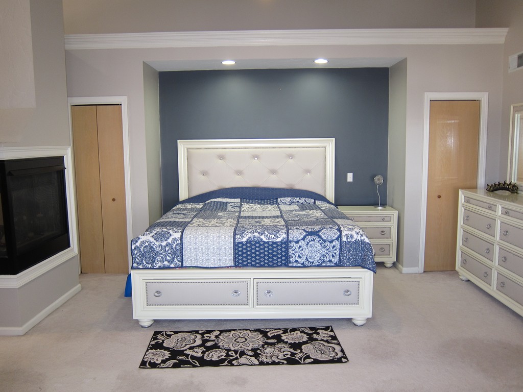 69 Half Crown Circle, Unit 69 Ashland, MA 01721 - Photo 12 of 25 a bedroom with a bed and a window