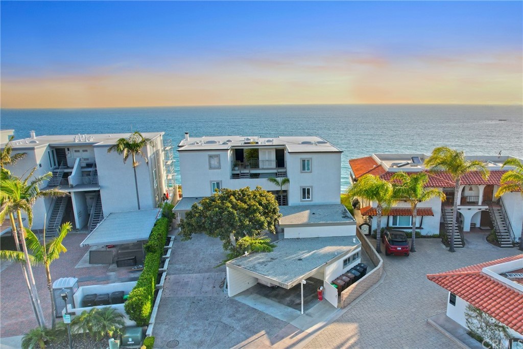 267 Avenida Lobeiro, Unit E San Clemente, CA 92672 - Photo 52 of 56 an aerial view of a chairs and table on the terrace